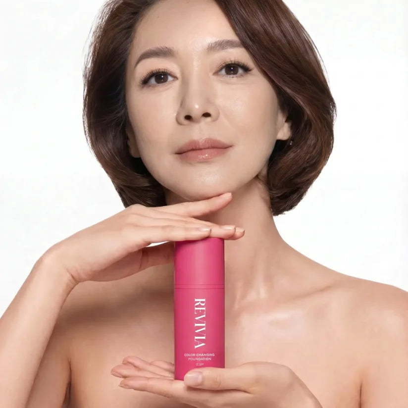 Lifestyle portrait holding Revivia foundation